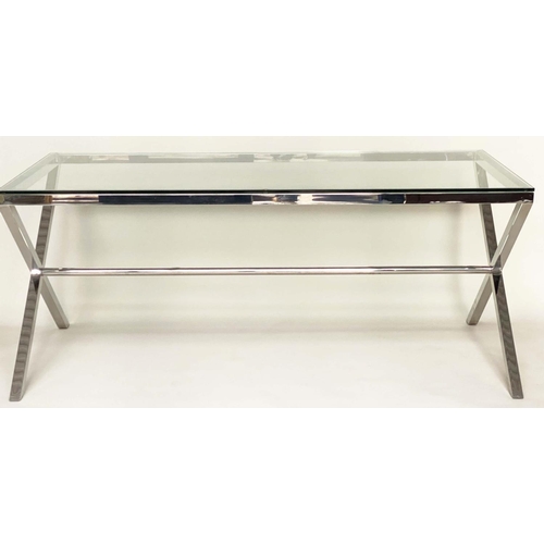 285 - DESK/WRITING TABLE BY OKA, rectangular plate glass raised upon chromium plated x frame support, with... 