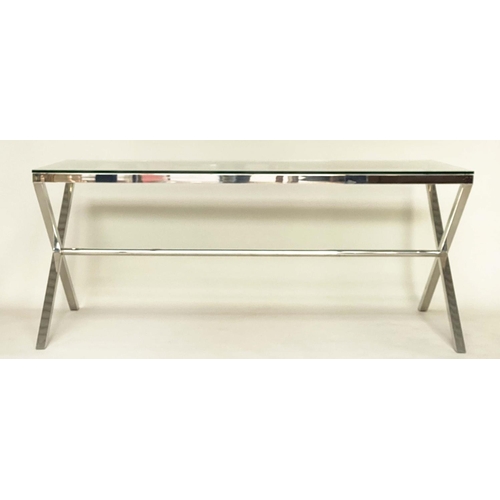 285 - DESK/WRITING TABLE BY OKA, rectangular plate glass raised upon chromium plated x frame support, with... 