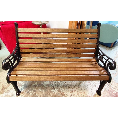 347 - GARDEN BENCH, 125.5cm W, black painted metal and slatted wood.