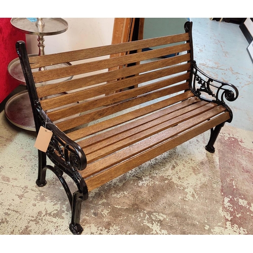 347 - GARDEN BENCH, 125.5cm W, black painted metal and slatted wood.