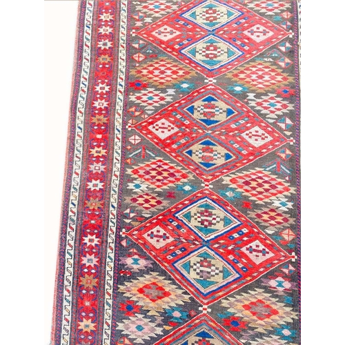 75 - ANTIQUE KAZAK RUNNER, 330cm x 100cm.