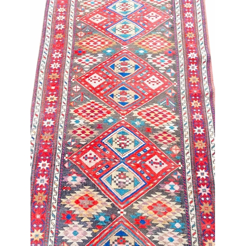 75 - ANTIQUE KAZAK RUNNER, 330cm x 100cm.