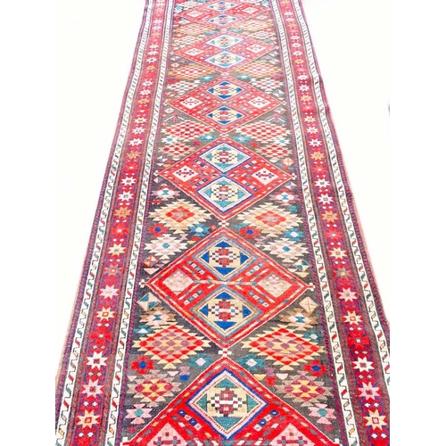 75 - ANTIQUE KAZAK RUNNER, 330cm x 100cm.