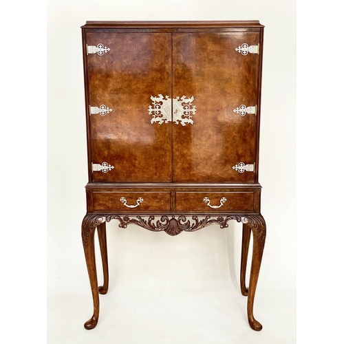 112 - COCKTAIL CABINET, Queen Anne style burr walnut and silvered metal mounted with two doors and carved ... 