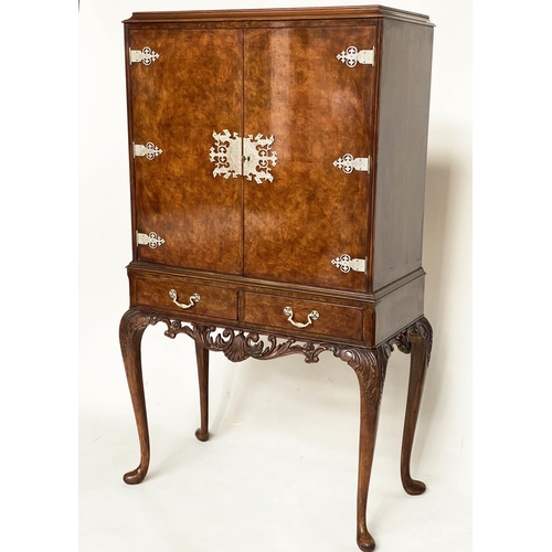 112 - COCKTAIL CABINET, Queen Anne style burr walnut and silvered metal mounted with two doors and carved ... 