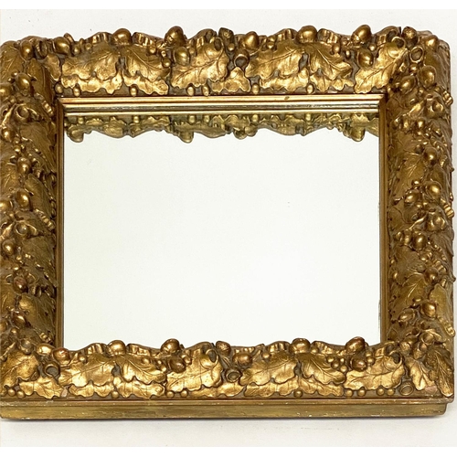 115 - WALL MIRROR, 19th century giltwood and composition, with carved oak leaf frame, 76cm x 63cm.