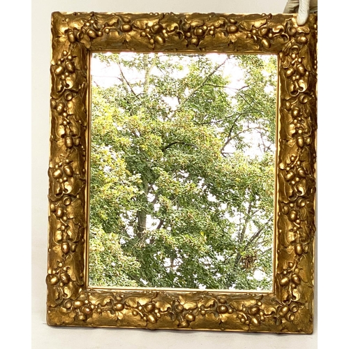 115 - WALL MIRROR, 19th century giltwood and composition, with carved oak leaf frame, 76cm x 63cm.