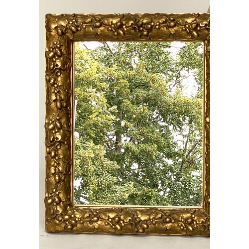 115 - WALL MIRROR, 19th century giltwood and composition, with carved oak leaf frame, 76cm x 63cm.