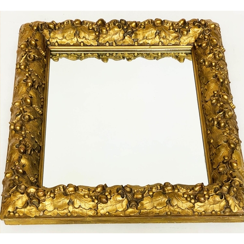 115 - WALL MIRROR, 19th century giltwood and composition, with carved oak leaf frame, 76cm x 63cm.