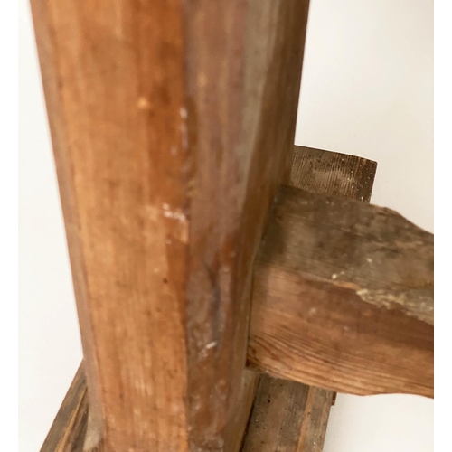 119 - DINING TABLE, early 20th century pine rectangular planked with slab trestle supports of shallow prop... 