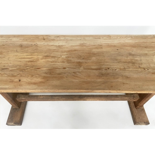 119 - DINING TABLE, early 20th century pine rectangular planked with slab trestle supports of shallow prop... 