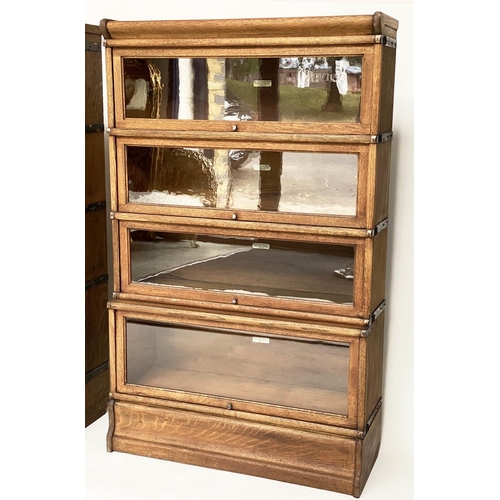 122 - GLOBE WERNICKE BOOKCASES, a pair, early 20th century oak each with four stacking glazed sections, wi... 