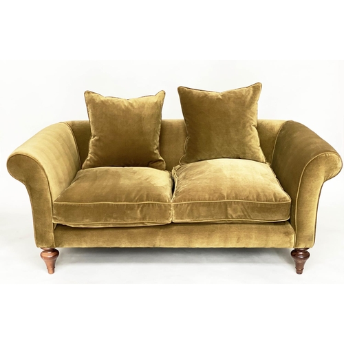 140 - SOFA BY 'SOFAS AND STUFF', the 'Clavering' two seat upholstered in olive green velvet with scrolled ... 