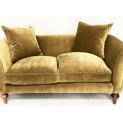 140 - SOFA BY 'SOFAS AND STUFF', the 'Clavering' two seat upholstered in olive green velvet with scrolled ... 