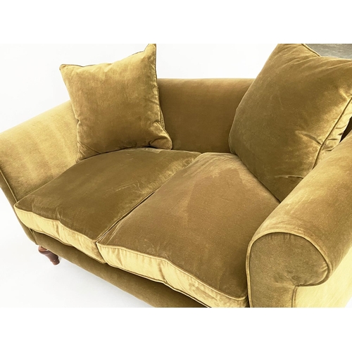 140 - SOFA BY 'SOFAS AND STUFF', the 'Clavering' two seat upholstered in olive green velvet with scrolled ... 