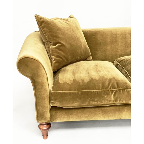 140 - SOFA BY 'SOFAS AND STUFF', the 'Clavering' two seat upholstered in olive green velvet with scrolled ... 