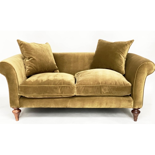 140 - SOFA BY 'SOFAS AND STUFF', the 'Clavering' two seat upholstered in olive green velvet with scrolled ... 