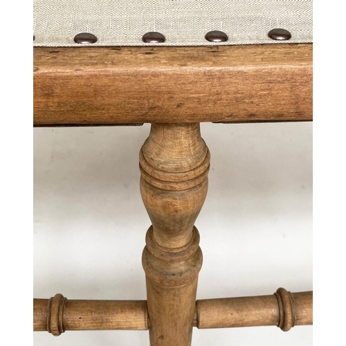 142 - HALL BENCH, Edwardian fruitwood with incised and spindle back and studded linen upholstered seat, 10... 