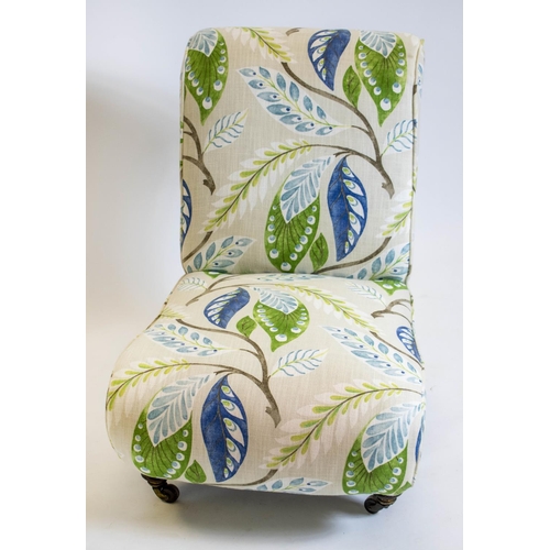 186 - SLIPPER CHAIR, 76cm H x 55cm W, Victorian in leaf patterned material on castors.