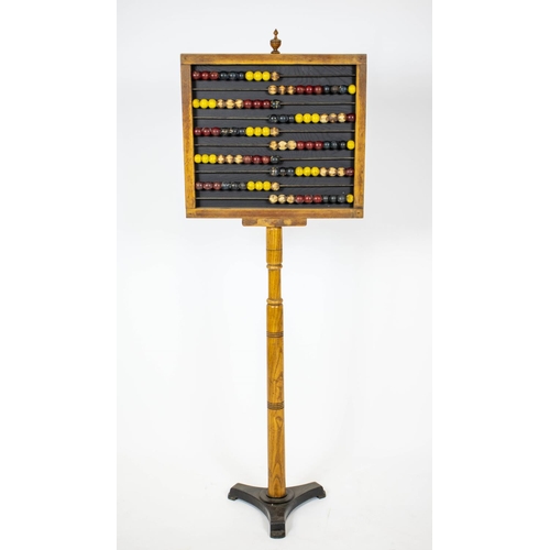 202 - ABACUS, 146cm H x 51cm W, 19th century ash and polychrome with iron base.