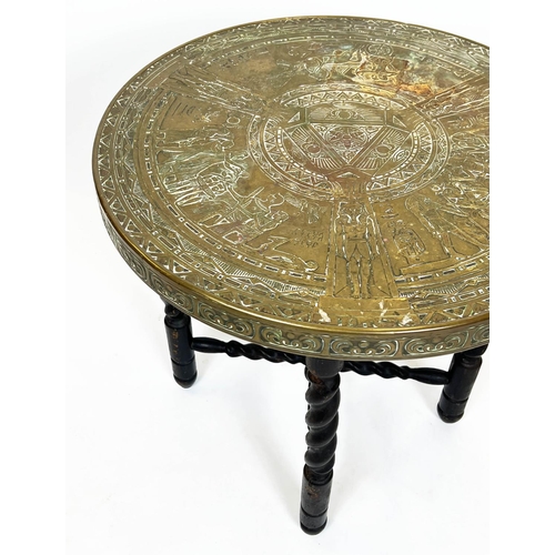 282 - LAMP TABLE, Egyptian design, brass top on folding barley twist base, 59cm H x 60cm W.