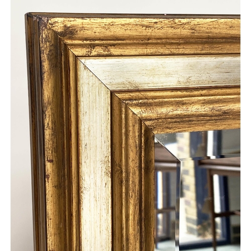 295 - WALL MIRROR, rectangular gilt wood with silvered marginal frame and bevelled plate, 75cm x 104cm.