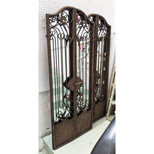 360 - ARCHITECTURAL GARDEN WALL MIRRORS, a pair, gated design, 128cm x 53cm. (2)