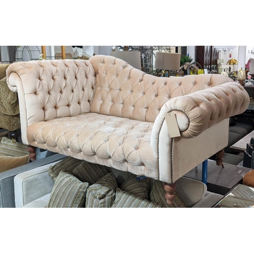 511 - SOFA, 178cm L x 83cm H with buttoned upholstery on short turned supports.