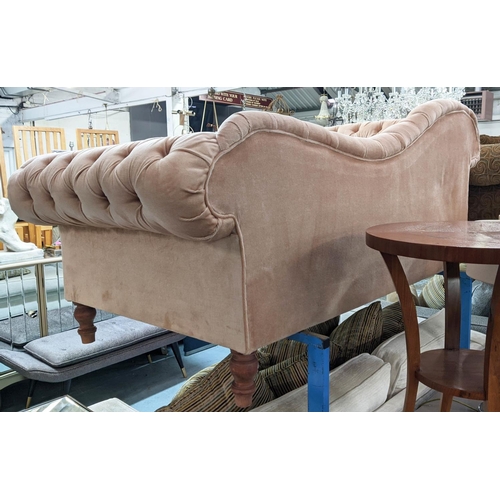 511 - SOFA, 178cm L x 83cm H with buttoned upholstery on short turned supports.