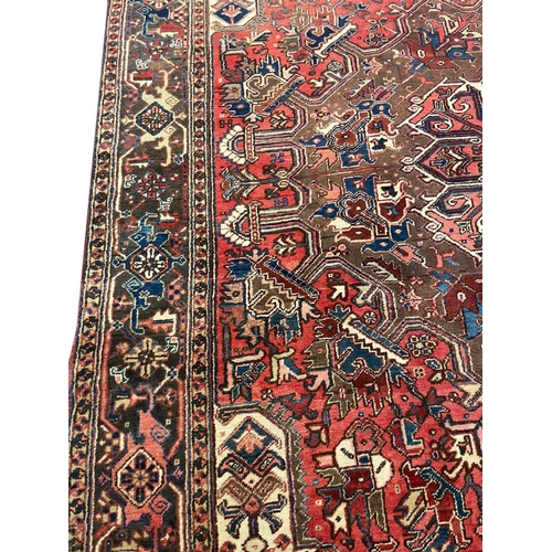 72 - PERSIAN HERIZ CARPET, 362cm x 265cm.