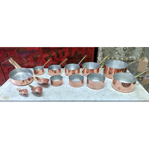 101 - BATTERIE DE CUISINE, comprising of a graduated set of five copper pans, the largest 20cm diam, anoth... 