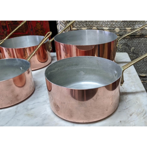 101 - BATTERIE DE CUISINE, comprising of a graduated set of five copper pans, the largest 20cm diam, anoth... 