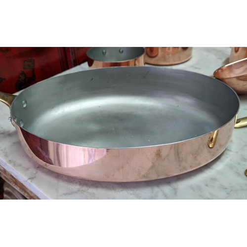 101 - BATTERIE DE CUISINE, comprising of a graduated set of five copper pans, the largest 20cm diam, anoth... 