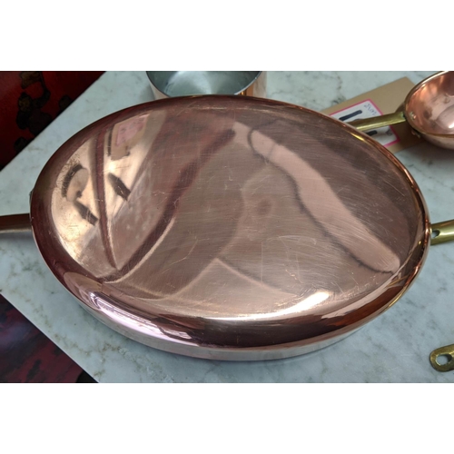 101 - BATTERIE DE CUISINE, comprising of a graduated set of five copper pans, the largest 20cm diam, anoth... 