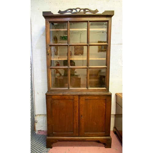 200 - BOOKCASE, 201cm H x 98cm x 42cm D, Georgian oak with glazed door, enclosing fixed shelves above two ... 