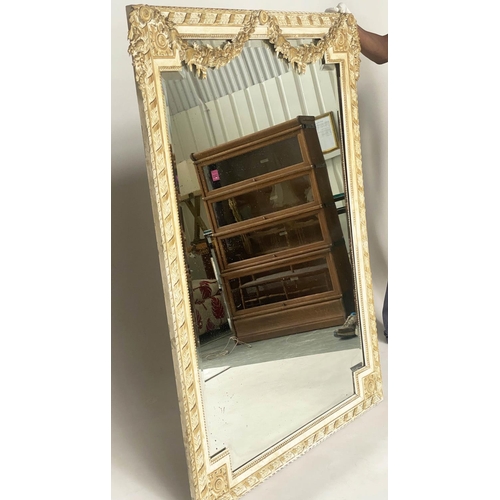 117 - WALL MIRROR, 19th century French giltwood and parcel gilt with bevelled mirror plate within a ribbon... 