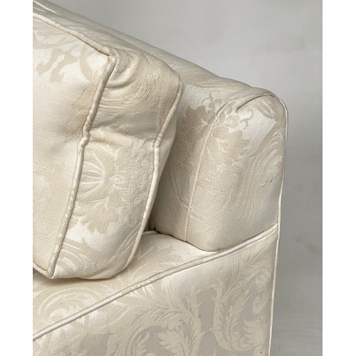 145 - SOFA, traditional two seater ivory brocade upholstered with down feather filled cushions, 135cm W.