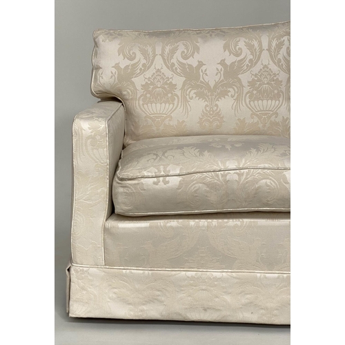 145 - SOFA, traditional two seater ivory brocade upholstered with down feather filled cushions, 135cm W.