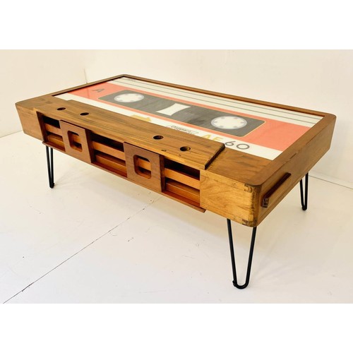 438 - LOW TABLE, 40cm high x 110cm wide x 60cm deep, cassette tape design, with storage to one side.