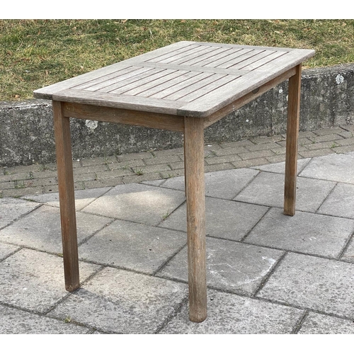 297 - GARDEN TABLE BY LISTER, 65cm D x 109cm W x 73cm H, weathered teak, of slatted construction.