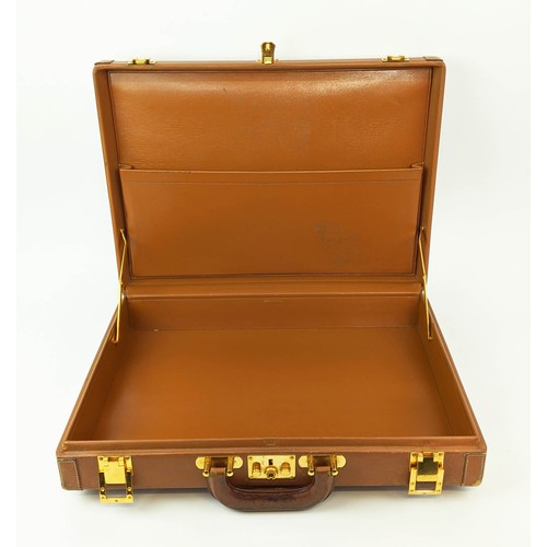 11 - HERMES LEATHER BRIEFCASE, leather lining, gold tone hardware.