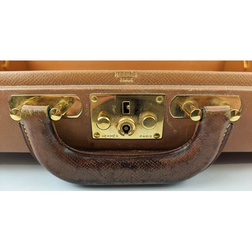 11 - HERMES LEATHER BRIEFCASE, leather lining, gold tone hardware.