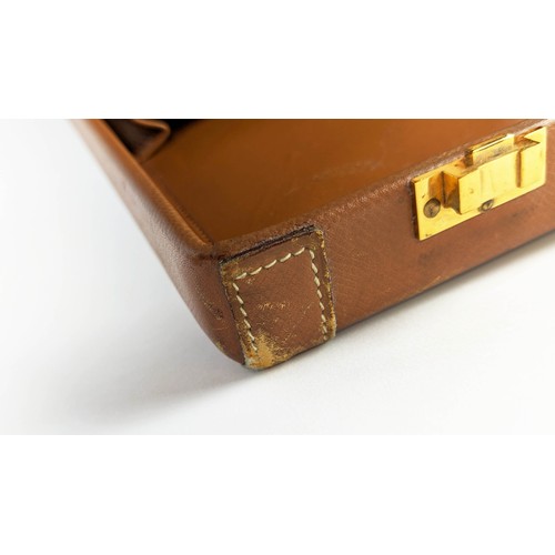 11 - HERMES LEATHER BRIEFCASE, leather lining, gold tone hardware.