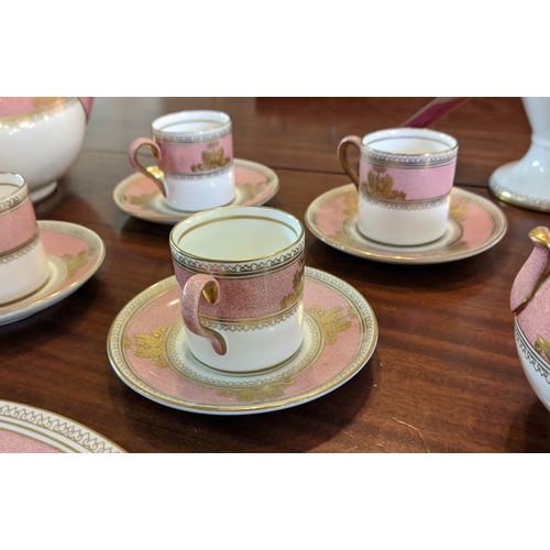 14 - WEDGWOOD COLUMBIA POWDER PINK COFFEE AND TEA SET, comprising coffee pot, teapot, four coffee cans an... 