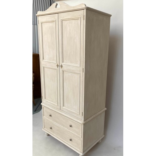 127 - ARMOIRE, French style traditionally grey painted with two panelled doors enclosing hanging space and... 