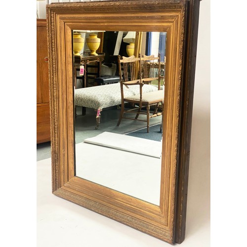 105 - WALL MIRROR, 19th century giltwood and gesso rectangular moulded and decorated frame enclosing bevel... 