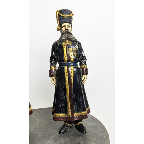 41 - AFTER FABERGÉ RUSSIAN COSSACKS, a set of two, cast metal, 41cm H each. (2)