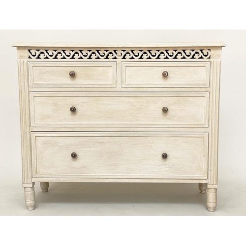 232 - COMMODE, French style traditionally grey painted with pierced frieze and four drawers, 75cm H x 89cm... 