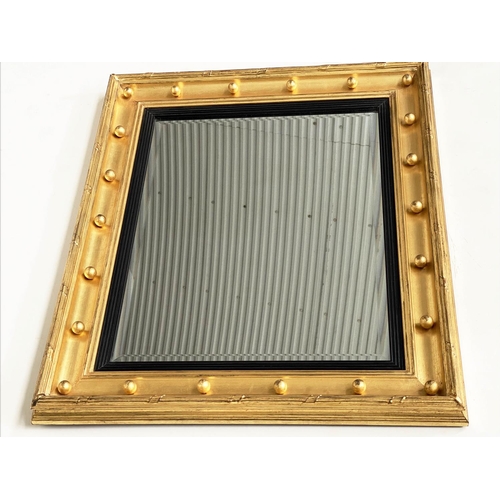 108 - WALL MIRROR, Regency style, with bevelled mirror plate, reeded slip and gilt ball and moulded frame,... 