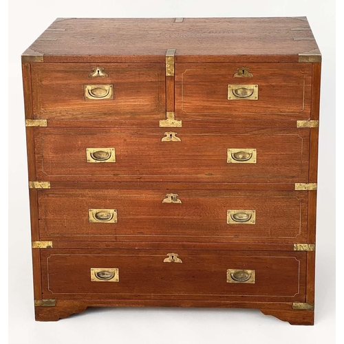 109 - CAMPAIGN STYLE CHEST, mid 20th century Indian, teak and brass bound with two short and three long dr... 